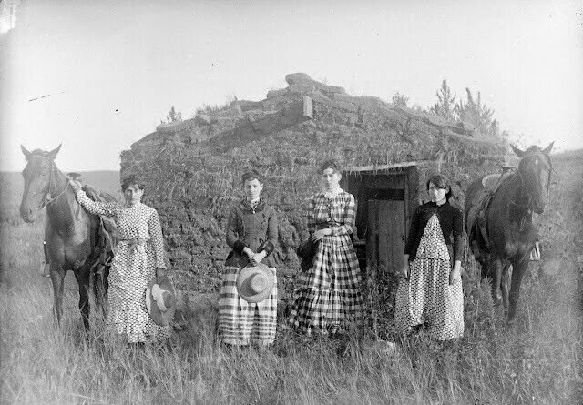 Harriet, Elizabeth, Lucie,& Ruth Chrisman, sod house Custer County Nebraska 1886
