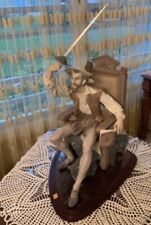 LLadro Porcelain Seated Don Quixote Quijote sitting in a chair with a high back picture
