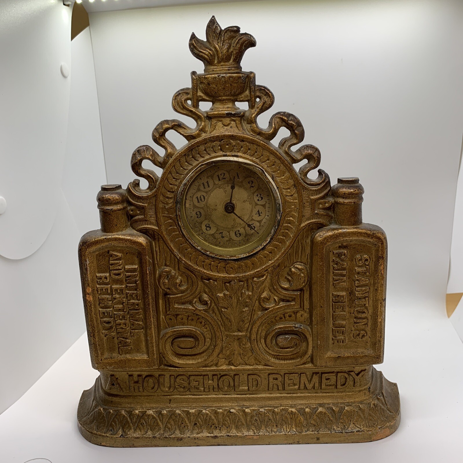 RARE Antique Stantons Pain Relief Cast Iron Clock Regent Stanton's AS IS RARE Antique Stantons Pain Relief Cast Iron Clock Regent Stanton's AS IS