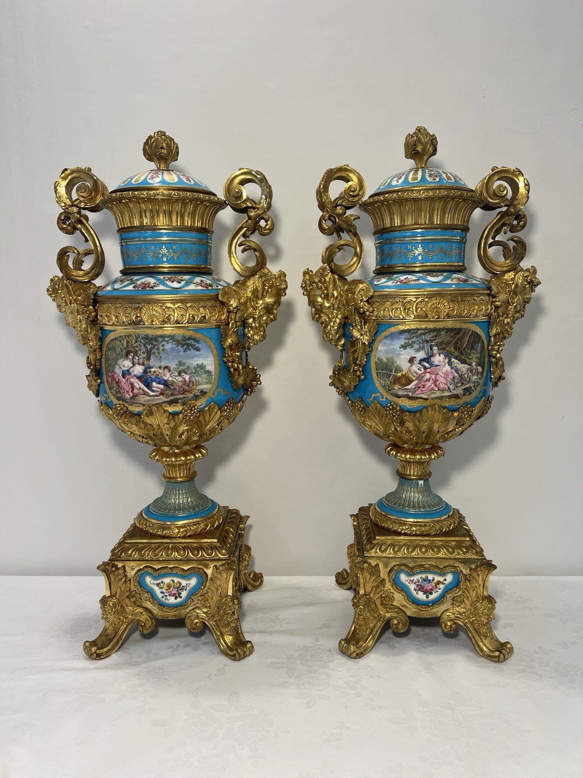 An Unusual Shaped Pair of 19th Century French Sevres Style Bronze Mounted Vases An Unusual Shaped Pair of 19th Century French Sevres Style Bronze Mounted Vases