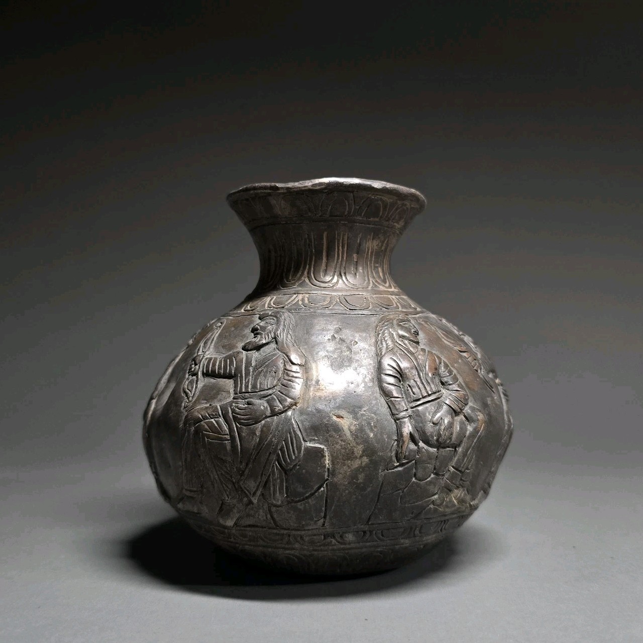 CIRCA NEAR EASTERN SCYTHIAN SILVER RITUAL VESSEL WITH SCENES OF EARLY HERCULES. CIRCA NEAR EASTERN SCYTHIAN SILVER RITUAL VESSEL WITH SCENES OF EARLY HERCULES.