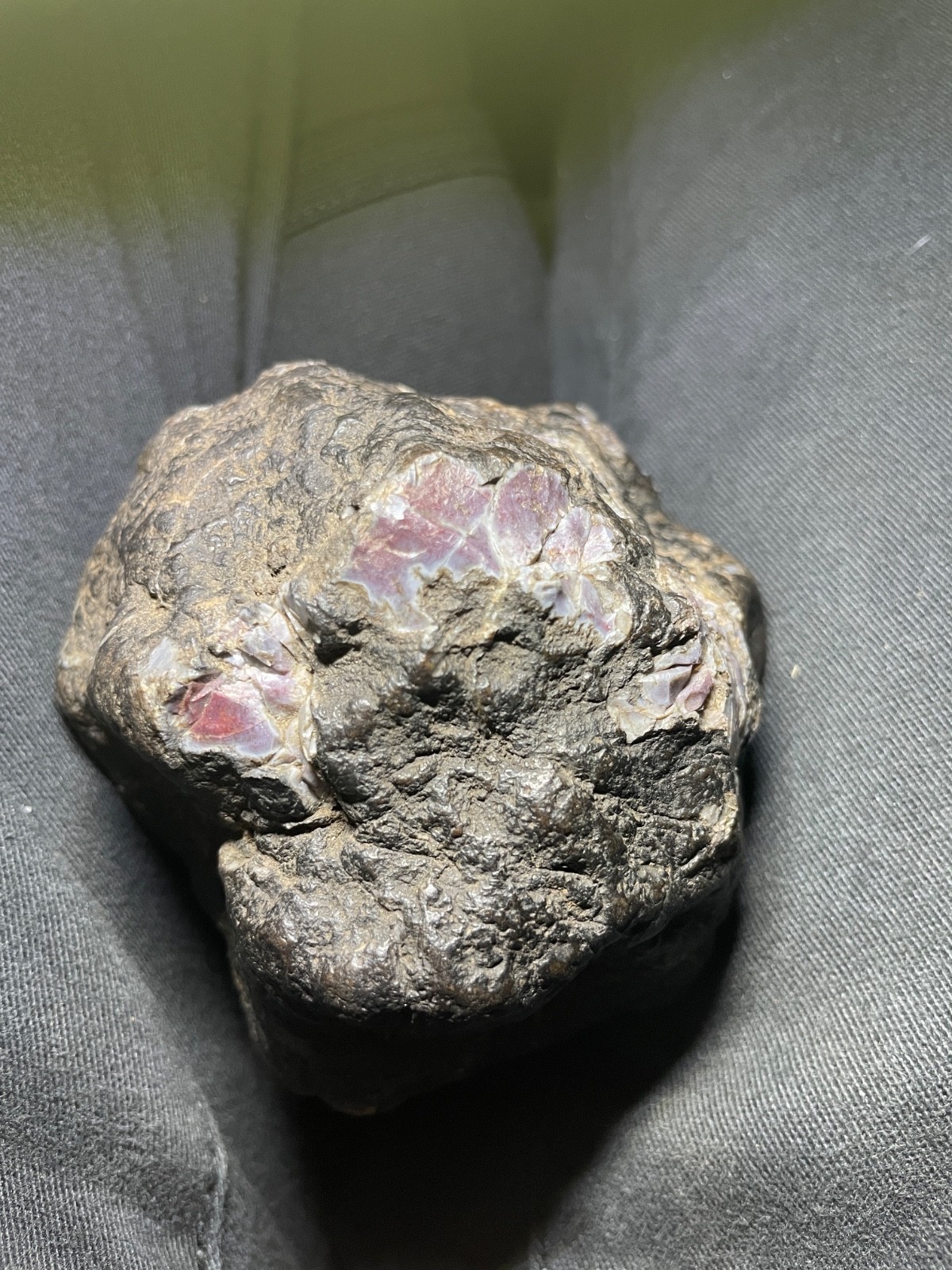 It is very heavy, has fusion crust along with chips & Dark in Color, so nice. It is very heavy, has fusion crust along with chips & Dark in Color, so nice.