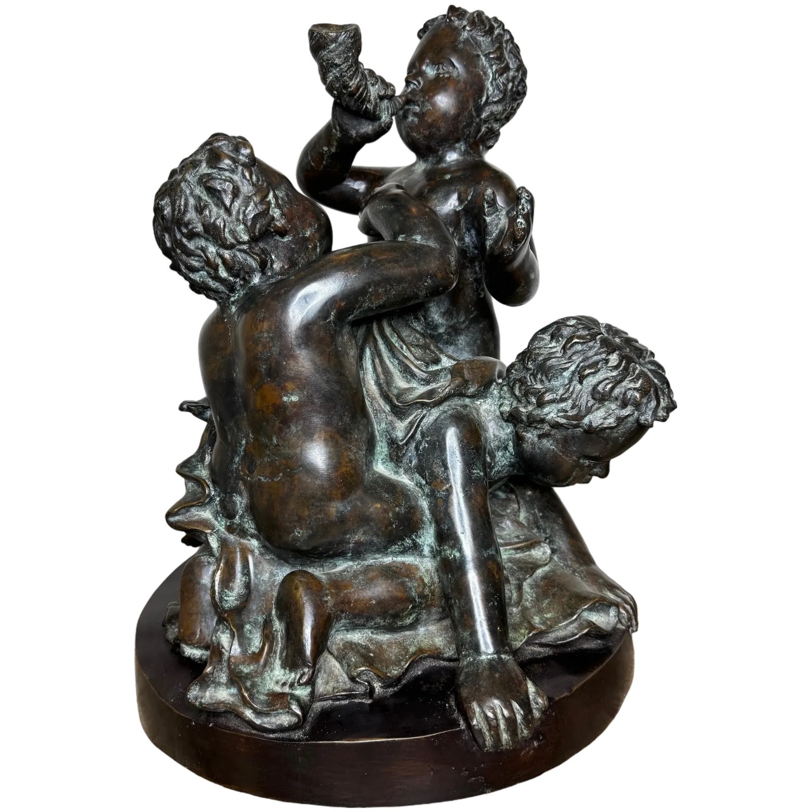 Bronze group calls de Triton conque mer putti in the manner of Claude Michel