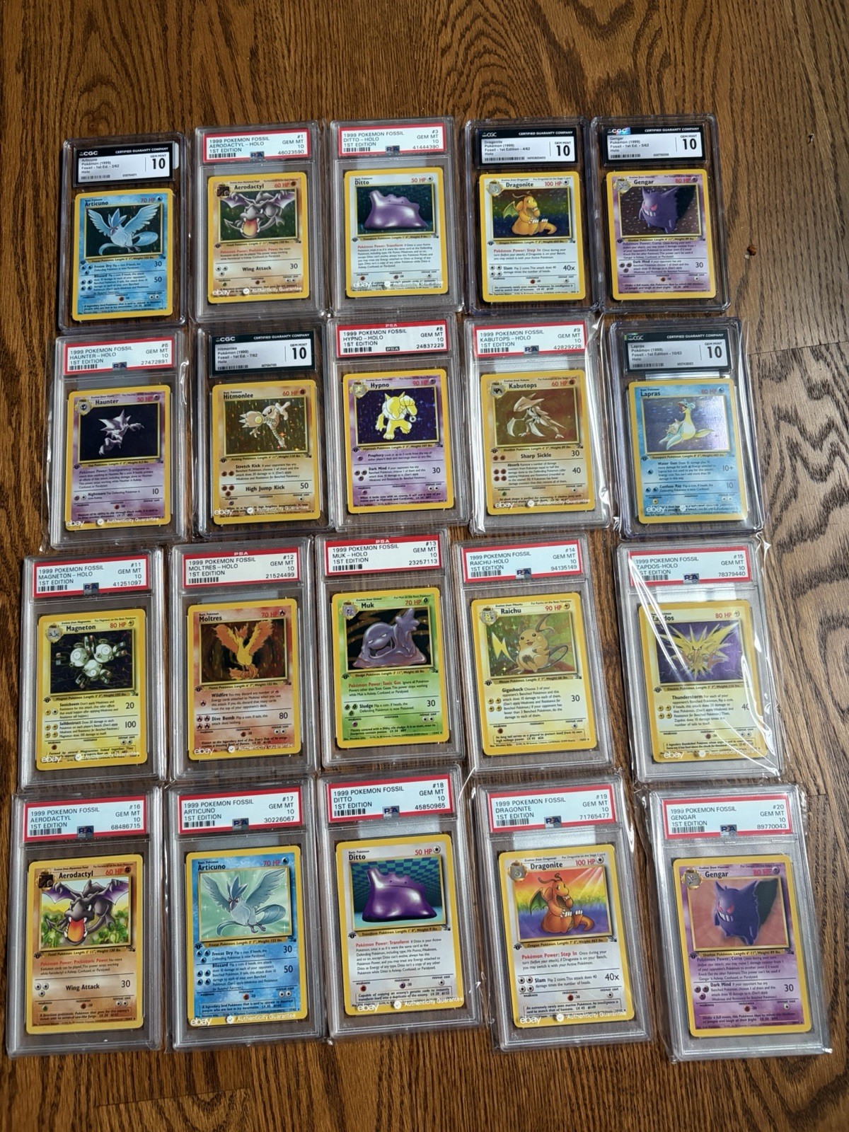 1999 Pokémon Fossil 1st Edition PSA / CGC 10 Master Set 1-62 1999 Pokémon Fossil 1st Edition PSA / CGC 10 Master Set 1-62