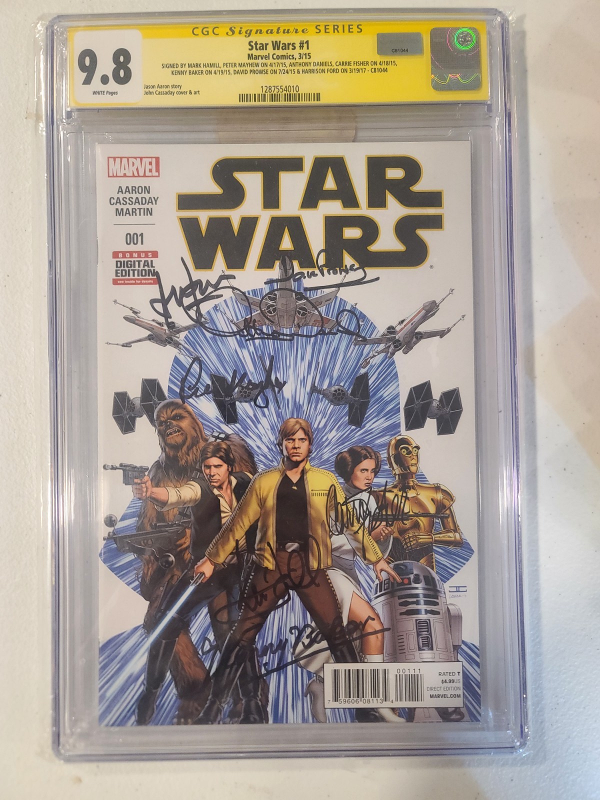 STAR WARS #1 CGC SS 9.8 NM SIGNED BY CAST x7 - FORD, FISHER, HAMILL, + 4 MORE STAR WARS #1 CGC SS 9.8 NM SIGNED BY CAST x7 - FORD, FISHER, HAMILL, + 4 MORE