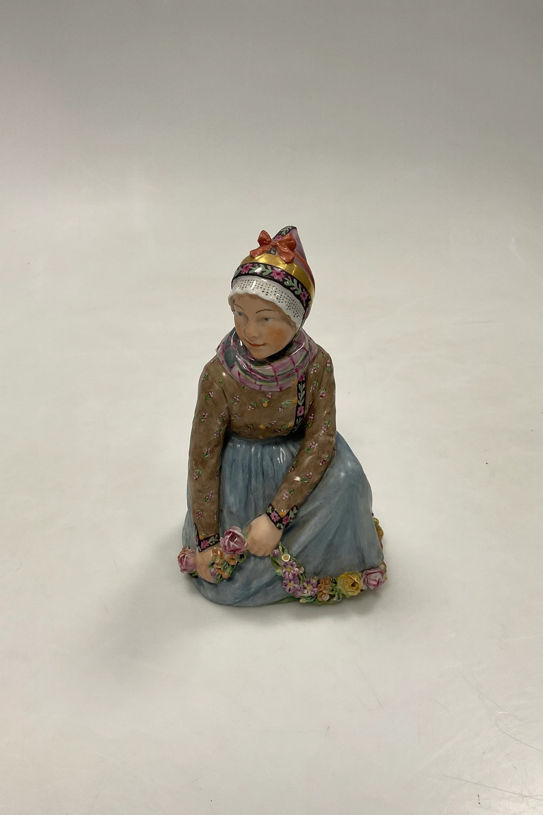 Royal Copenhagen Seated Fano Girl Figurineby Carl Martin-Hansen No. 12413