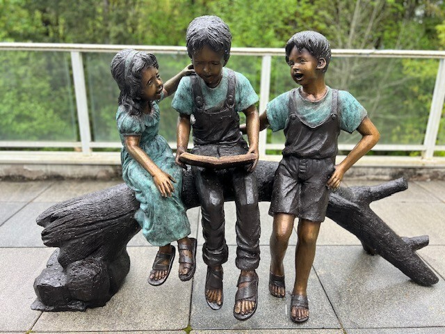 Gorgeous Life-size Happy Children on a Branch 