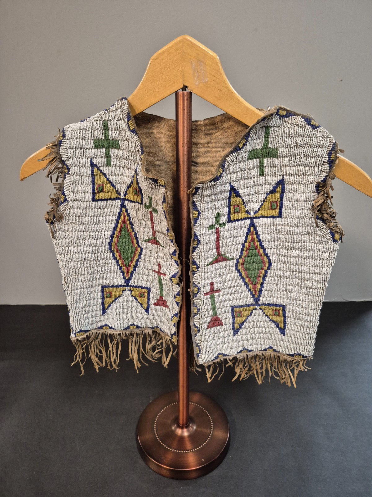 Sioux Child's Beaded Hide Vest with American Flags Sioux Child's Beaded Hide Vest with American Flags