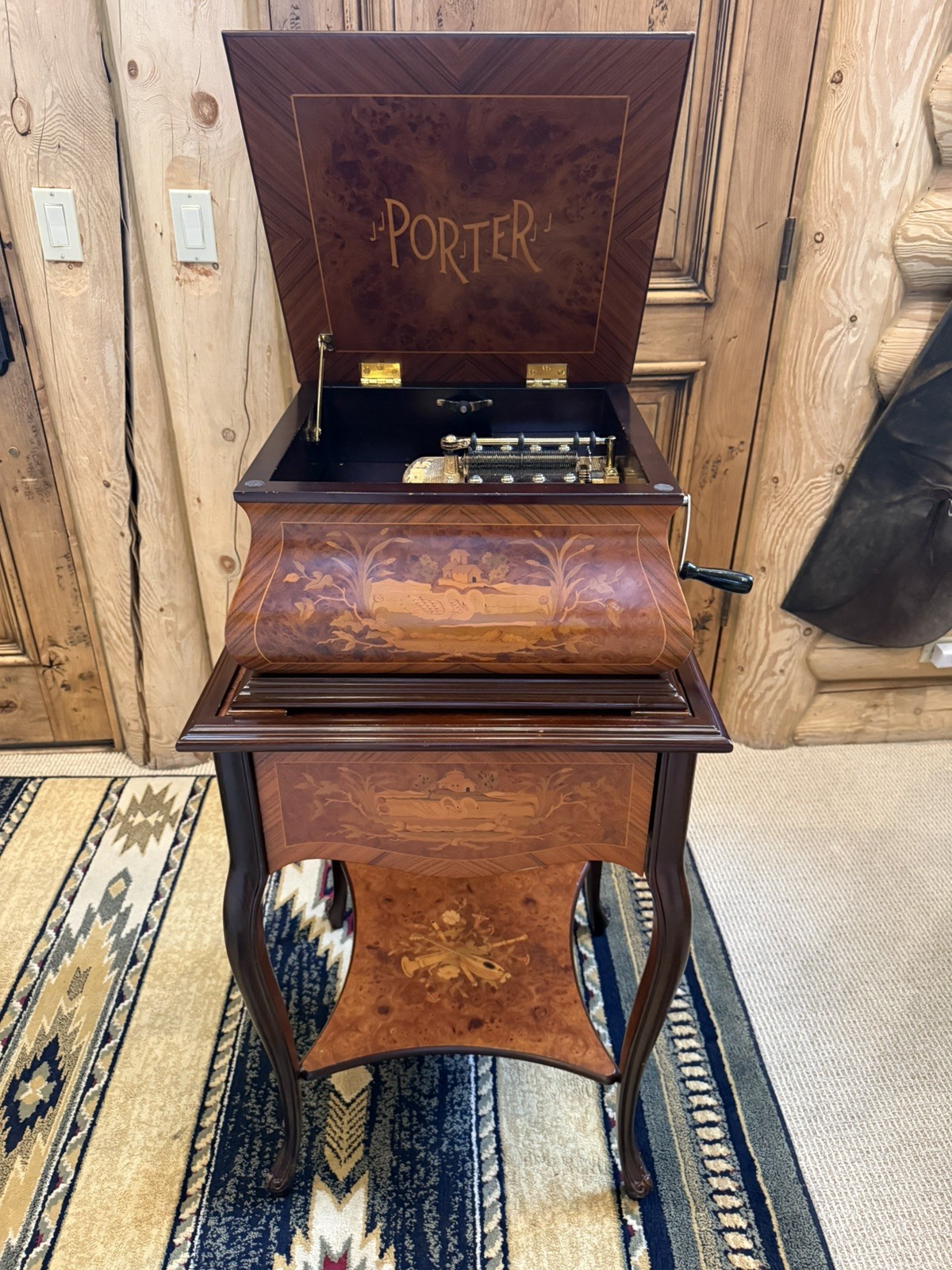 Beautiful Swan Porter music box with matching cabinet, comes with 20 discs. Beautiful Swan Porter music box with matching cabinet, comes with 20 discs.