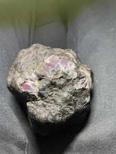 It is very heavy, has fusion crust along with chips & Dark in Color, so nice. picture