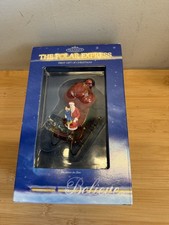 Hallmark Keepsake Ornament The Polar Express First Gift of Christmas Santa 2004 picture