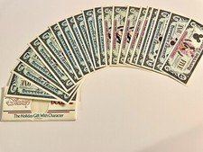 20 Assorted Disney Dollars Mickey, ranging between 1990-1995, one $5 1994 Goofy picture