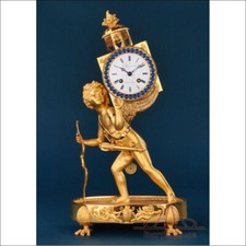 Antique Empire Gilded Bronze Clock ‘The Magic Lantern’. France, XIX cent. picture