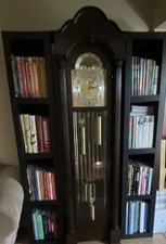 Herschede Brand, Brown Grandfather Clock with Pendulum, Wooden Case, Glass Front picture
