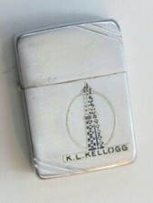 Vintage Zippo KL Kellogg 4-Barrel Brass Case Metal Plate Lighter picture
