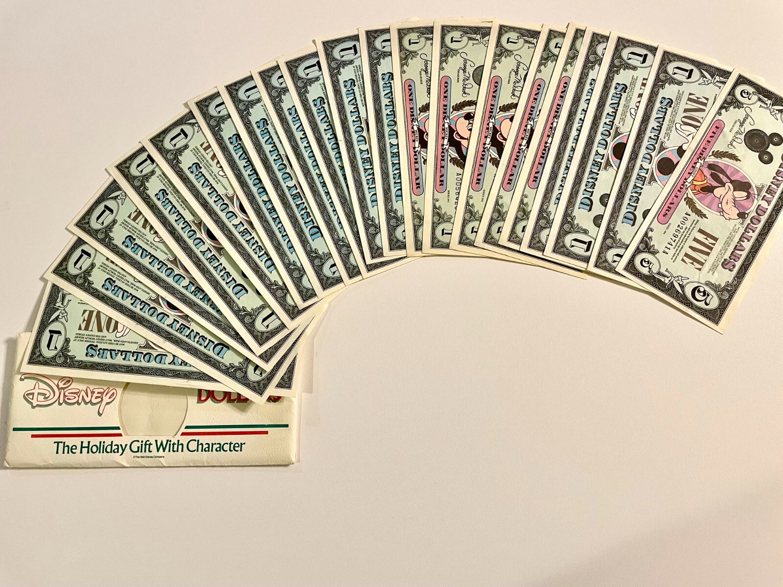 20 Assorted Disney Dollars Mickey, ranging between 1990-1995, one $5 1994 Goofy 20 Assorted Disney Dollars Mickey, ranging between 1990-1995, one $5 1994 Goofy