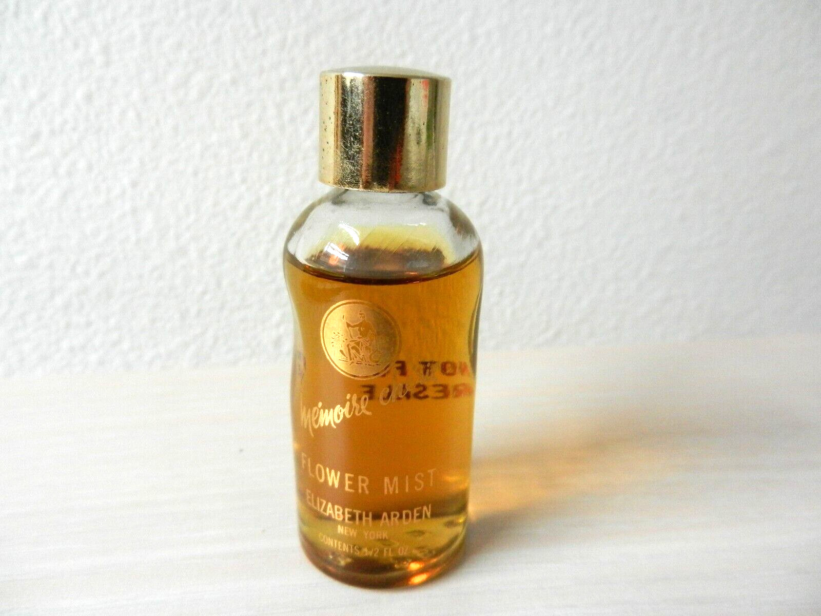 Vintage Elizabeth Arden Evyan Memoires Cherie flower Mist ½ fl oz glass bottle Vintage Elizabeth Arden Evyan Memoires Cherie flower Mist ½ fl oz glass bottle